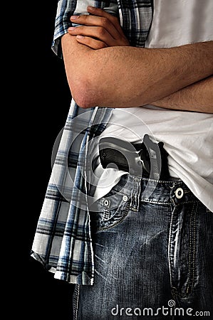 Gun in pants Stock Photo