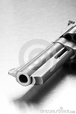 Gun - revolver on steel Stock Photo