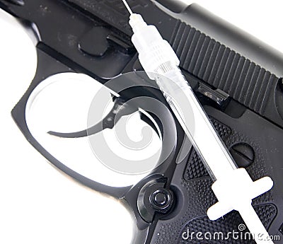 Gun and syringe Stock Photo