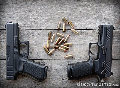 Gun on wood Stock Photo