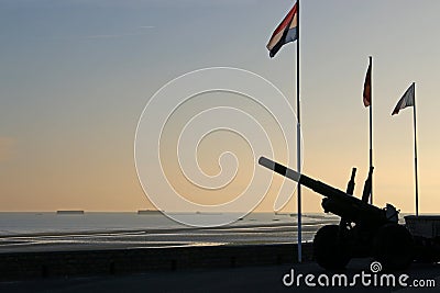 Guns at Arromanches at dawn Stock Photo