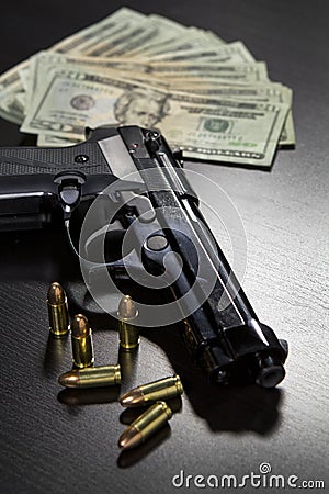 Guns and money Stock Photo