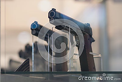 Guns on a show-window of shop Stock Photo