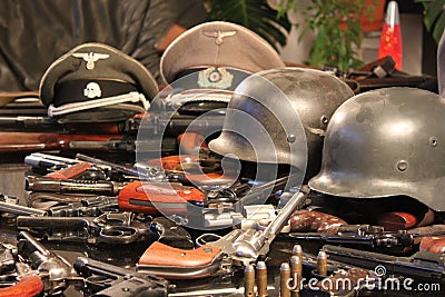 Guns and war helmets Stock Photo