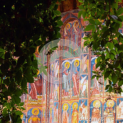 Fresco on wall of monastery GURA HUMORULUI, ROMANIA Editorial Stock Photo