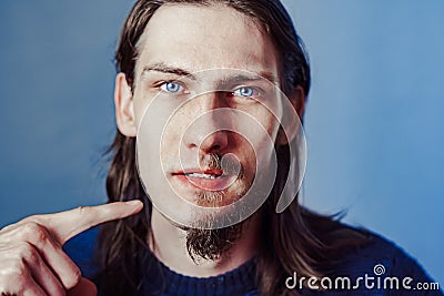 The guy with the beard on half his face Stock Photo