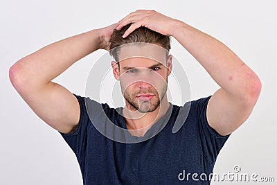 Guy with bristle in blue tshirt. Macho with confident face Stock Photo