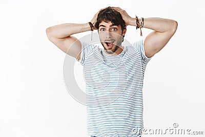 Guy cannot believe miracle can happen. Portrait of impressed and surprised speechless attractive boyfriend with mascules Stock Photo