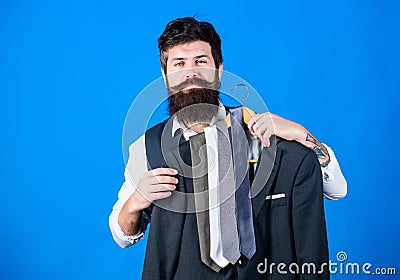 Guy choosing necktie. Perfect necktie. Shopping concept. Shop assistant or personal stylist service. Stylist advice Stock Photo