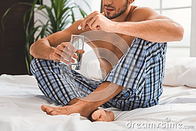 Guy curing himself after crapulence Stock Photo