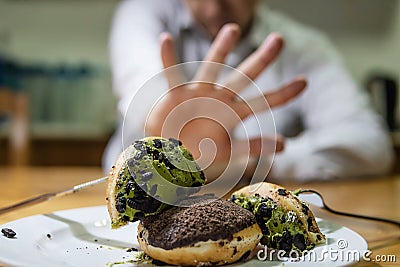 Guy disagree to eat donut Stock Photo