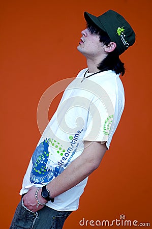 Guy in Dreamstime Shirt/Cap Stock Photo