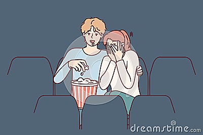 Guy and girl are watching horror movie in cinema and eating popcorn enjoying films about vampires Vector Illustration