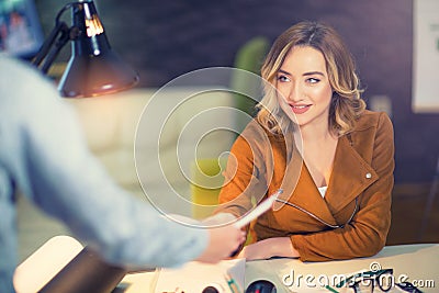 Guy giving a curriculum vitae to his interviewer Stock Photo