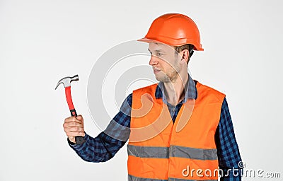 Guy with hammer professional master repair wear helmet uniform, tools shop concept Stock Photo