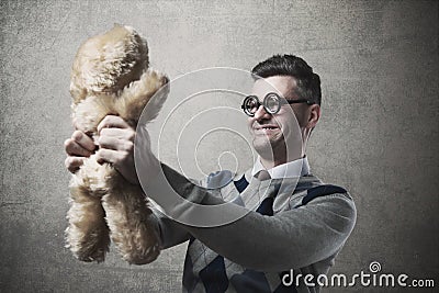 Guy holding a teddy bear Stock Photo