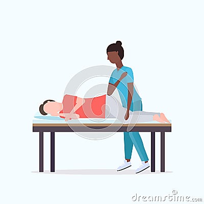 Guy lying on massage bed african american masseuse therapist doing healing treatment massaging injured patient manual Vector Illustration