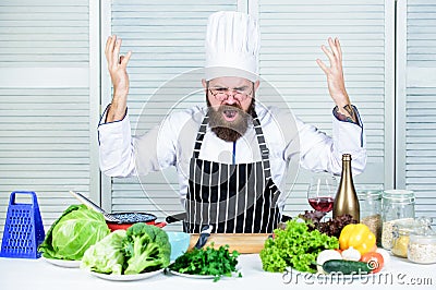 Guy in professional uniform ready cook. Master chef concept. Culinary challenge. Chef handsome hipster. Get ready. Man Stock Photo