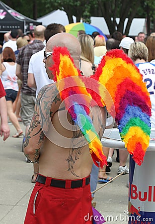 Guy with Rainbow Angel Wings at Indy Pride Editorial Stock Photo