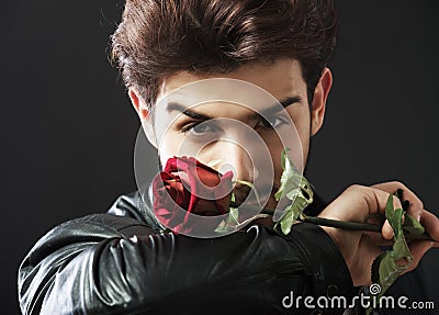 Guy with a red rose Stock Photo