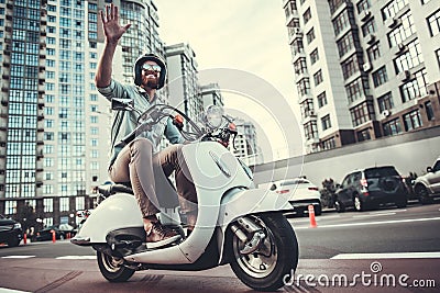 Guy on scooter Stock Photo