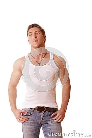 Guy in sleeveless shirt and jeans Stock Photo