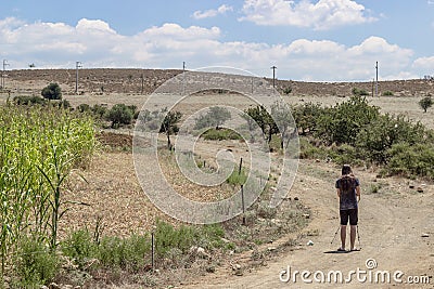 Guy is taken shot of landscape near corn field Editorial Stock Photo