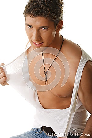 Guy tearing sleeveless shirt Stock Photo