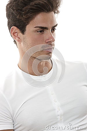 Guy white t-shirt looking ahead / Thinking man Stock Photo