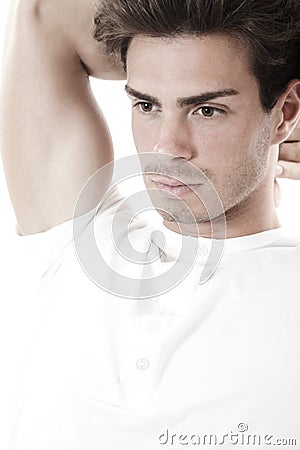 Guy white t-shirt looking ahead / Thinking man iso Stock Photo