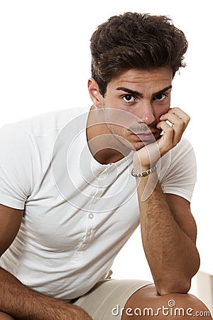 Guy white t-shirt looking / Isolated man Stock Photo