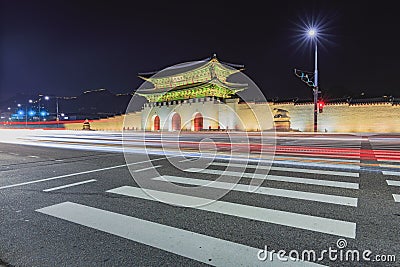 Gyeongbokgung Palace At Night In South Korea, with the name of t Stock Photo