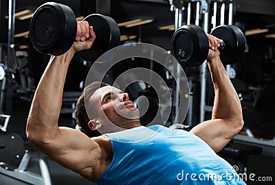 Gym bench press workout Stock Photo