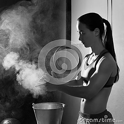 Gym Chalk Magnesium Carbonate hands clap woman Stock Photo