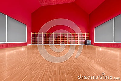 Gymnasium room with red wall Stock Photo