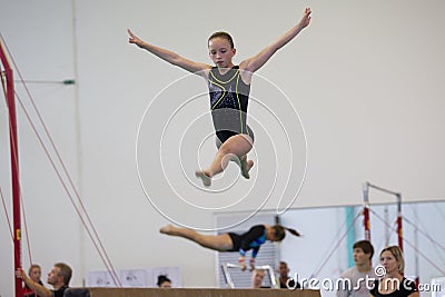 Gymnastics Girl Beam Jump Editorial Stock Photo