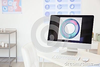 Gynecology consultation. Monitor with menstrual cycle Stock Photo