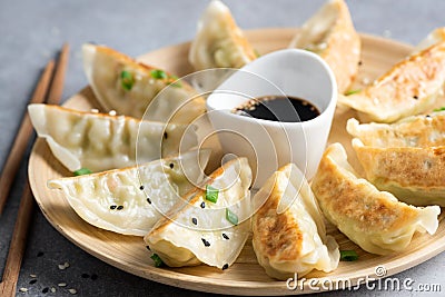 Gyoza or jiaozi fried stuffed dumplings Stock Photo
