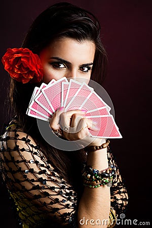 Gypsy woman with fan of cards Stock Photo