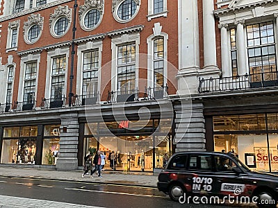 Oxford street with H&M fashion store is the busiest street in Europe Editorial Stock Photo