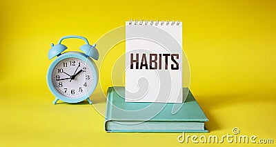 Habits word written on notepad Stock Photo