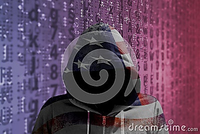 Hacker in an american hoody in front of a code background with binary streams and information security terms cybersecurity concept Stock Photo