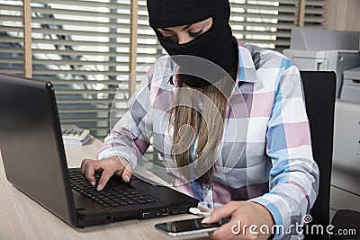 Hacker attacks from phone and computer Stock Photo