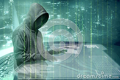 Hacker in black hoodie touching virtual screen on the table with server data, binary code, bar graph and world map Stock Photo