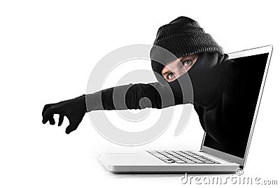 Hacker and cyber criminal man out computer screen with grabbing and stealing conceptual password hacking and cyber crime Stock Photo
