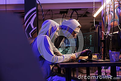 Hacker demonstrating malicious software Stock Photo