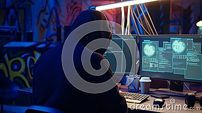 Hacker destroying firewalls and infecting computers, dolly in shot Stock Photo