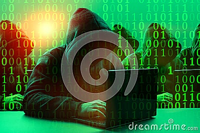 Hacker group. Dangerous hooded group of hackers. Internet, cyber crime, cyber attack, system breaking and malware concept. Dark Stock Photo