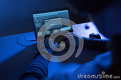 Hacker with progress loading bar on laptop Stock Photo
