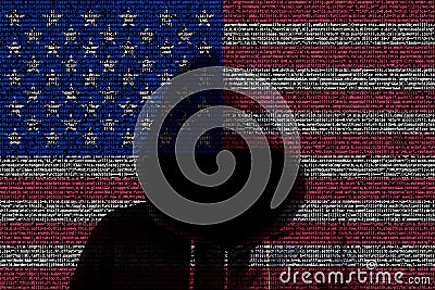 Hacker shininhg through american computer code flag Stock Photo